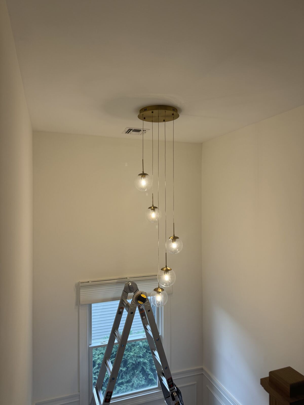 Pendant light fixtures hanging in an interior room